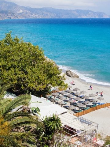 7 Best Beach Town Paradises In Spain, North Spain Vs South Spain: Which One Is Better For Travel And Food, 10 Most Beautiful Beach Towns in Spain, How To Get From Malaga Airport to Nerja Best Way, cheapest way from Malaga Airport to Nerja, cheapest way from Malaga to Nerja, Malaga Airport to Nerja, Malaga to Nerja, bus from Malaga Airport to Nerja, taxi from Malaga Airport to Nerja, uber from Malaga Airport to Nerja, train from Malaga Airport to Nerja, shuttle bus from Malaga Airport to Nerja, private transfer from Malaga Airport to Nerja
